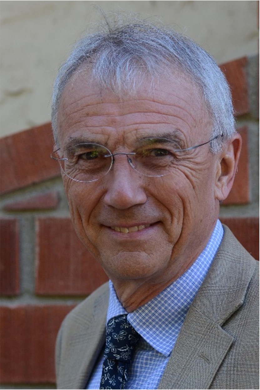 man in suit with glasses